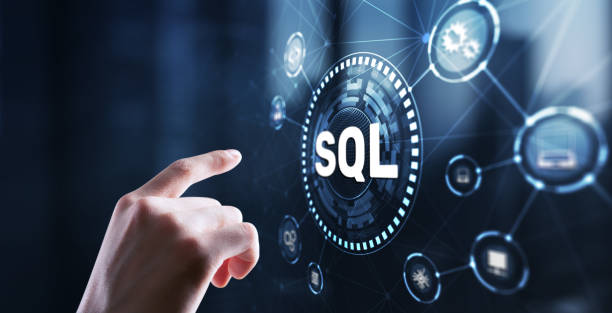 Hand reaching toward holographic SQL interface with digital icons and network connections on a dark background.